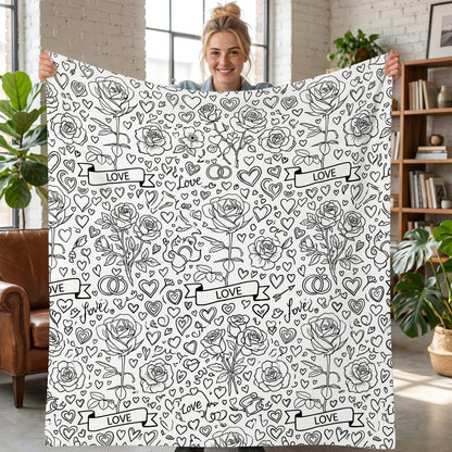 DIY coloring blanket, Rose & Love design, held up in a living room