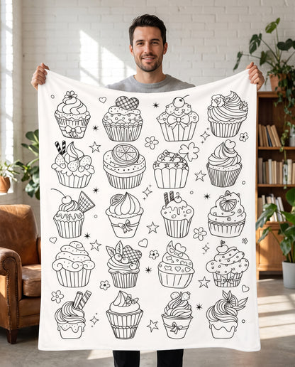 DIY coloring blanket, Cupcakes design, held up in a living room