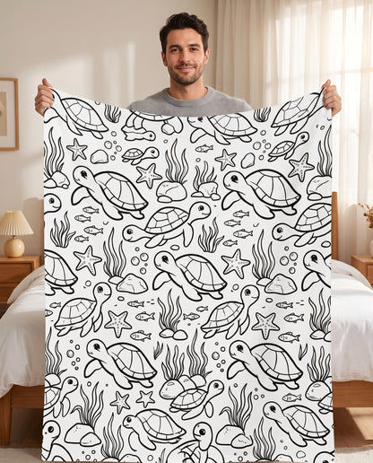 DIY coloring blanket, Sea Turtle design, held up in a living room