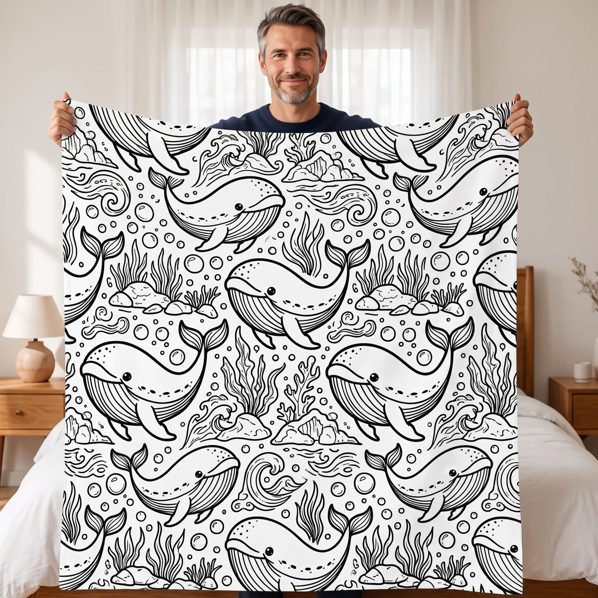 DIY coloring blanket, Whale design, held up in a living room