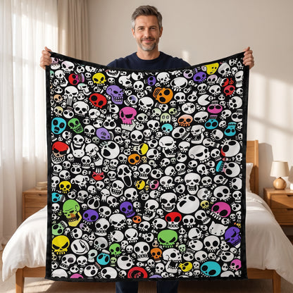 DIY coloring blanket, Terrified Skeleton design, held up in a living room