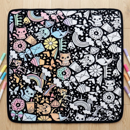 Sweet Doodles coloring blanket half colored in, half plain white